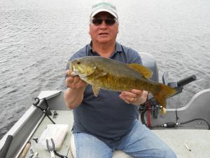 Dennis Bass fishing Lower Manitou Barker Bay Resort