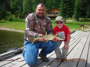 Rich and son Northern off the dock Barker Bay Resort