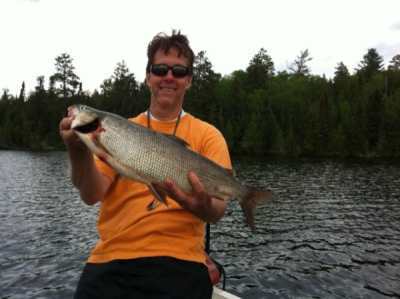 Mark with a whitefish from the Manitou